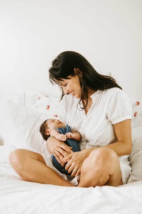 A mother holding her newborn